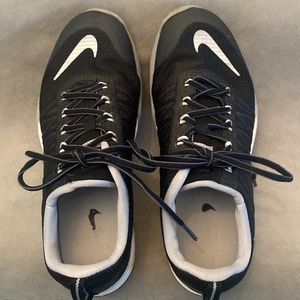 Nike women’s black sneaker. Size 9.